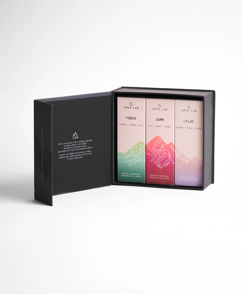Three apax labs mineral product boxes in a black box with gradient designs on a white background